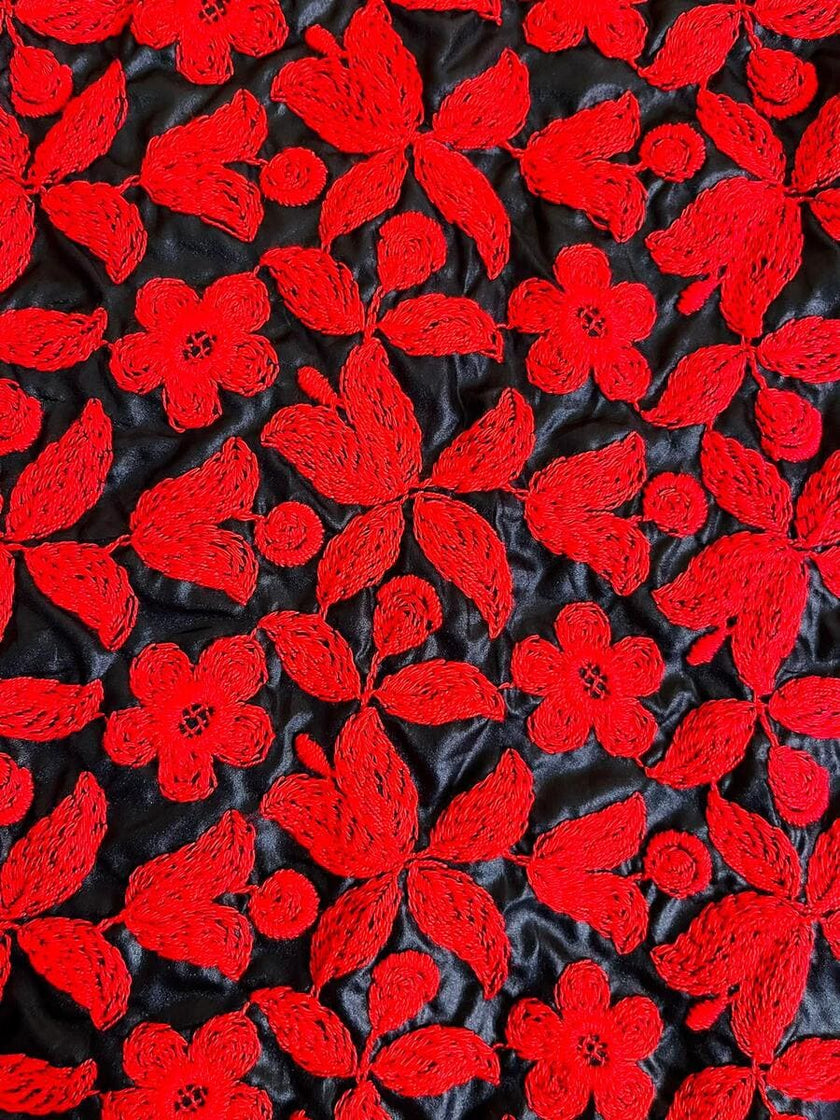 Bolero in tessuto lucido nero con ricamo floreale rosso