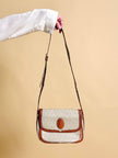 Sac bandoulière en tissu logoté couleur corde et cuir fauve 