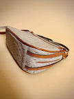 Sac bandoulière en tissu logoté couleur corde et cuir fauve 