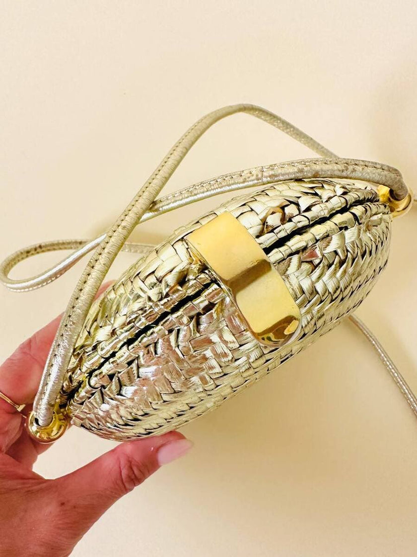 Borsa rotonda in midollino oro con tracolla in pelle laminata oro “Rodo”