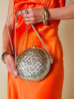 Borsa rotonda in midollino oro con tracolla in pelle laminata oro “Rodo”