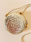 Borsa rotonda in midollino oro con tracolla in pelle laminata oro “Rodo”