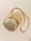 Borsa rotonda in midollino oro con tracolla in pelle laminata oro “Rodo”