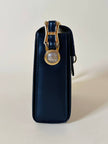 Borsa in pelle blu con hardware oro “Gianni Versace”
