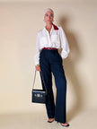 Borsa in pelle blu con hardware oro “Gianni Versace”