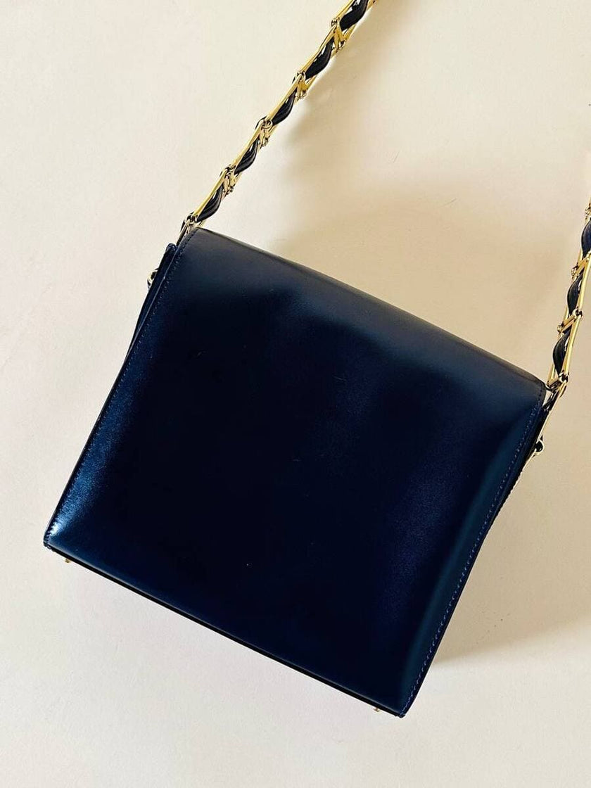 Borsa in pelle blu con hardware oro “Gianni Versace”