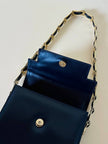Borsa in pelle blu con hardware oro “Gianni Versace”