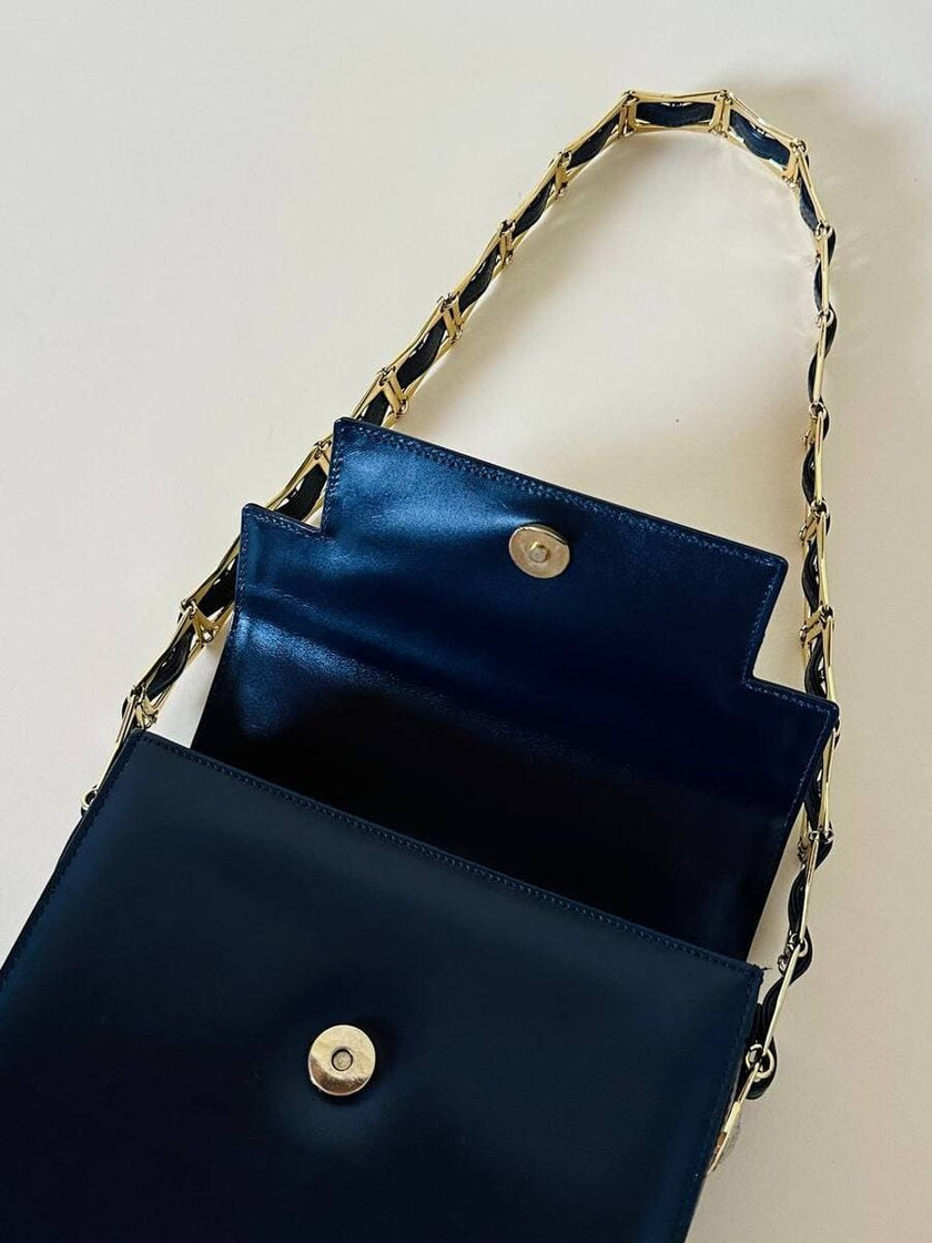 Borsa in pelle blu con hardware oro “Gianni Versace”