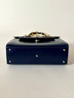 Borsa in pelle blu con hardware oro “Gianni Versace”