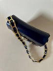 Borsa in pelle blu con hardware oro “Gianni Versace”