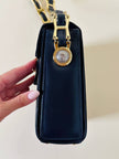 Borsa in pelle blu con hardware oro “Gianni Versace”
