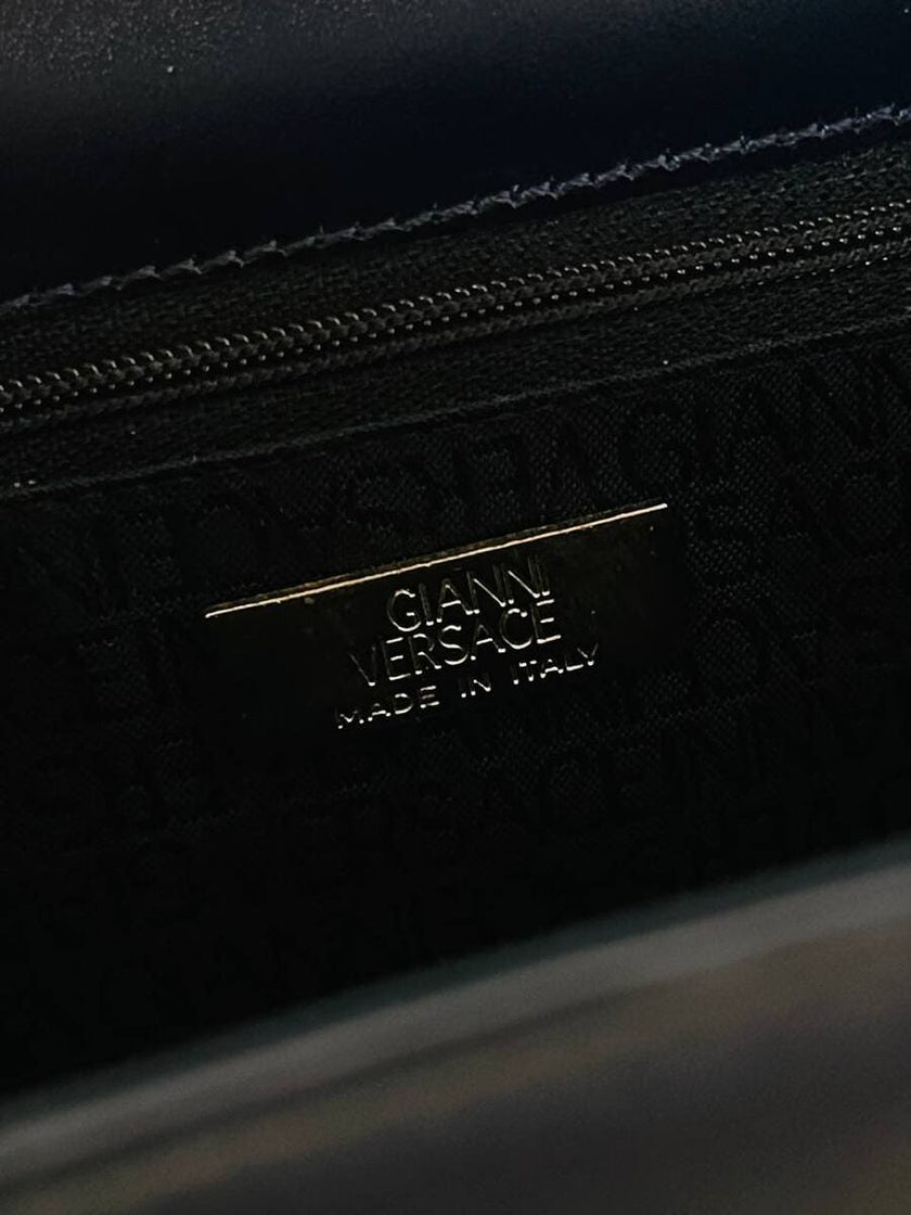 Borsa in pelle blu con hardware oro “Gianni Versace”