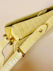 Borsa in pelle stampa coccodrillo giallo pastello “Genny”