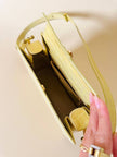 Borsa in pelle stampa coccodrillo giallo pastello “Genny”