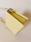 Borsa in pelle stampa coccodrillo giallo pastello “Genny”