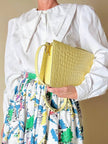 Borsa in pelle stampa coccodrillo giallo pastello “Genny”