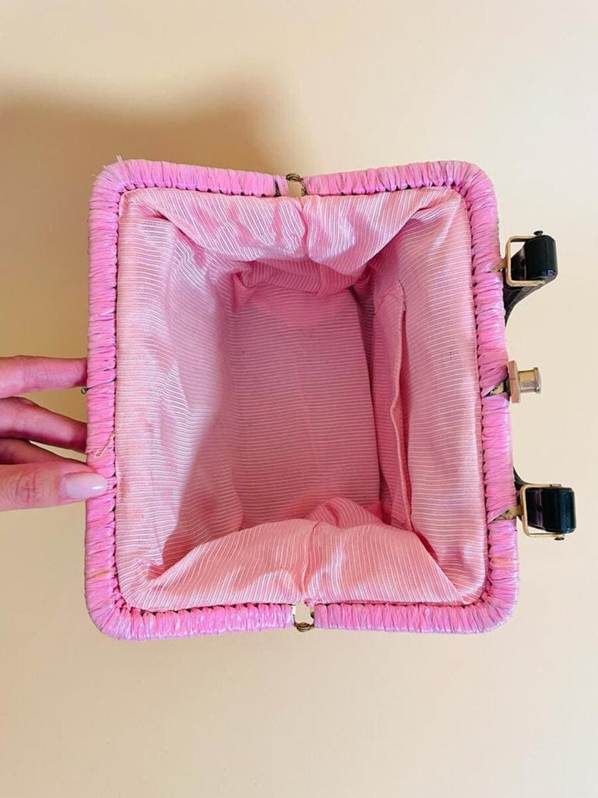 Borsa in rafia rosa lavorata con cordino in tinta