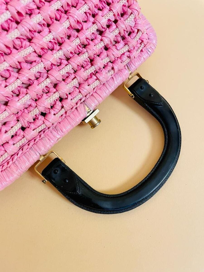 Borsa in rafia rosa lavorata con cordino in tinta