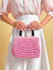 Borsa in rafia rosa lavorata con cordino in tinta