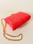 Borsa in midollino color geranio con chiusura a nodo e catena dorata “Rodo”