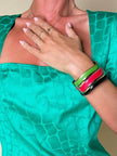 Bracciale rigido lavorato a righe con smalti multicolor “Krizia Poi”