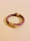 Bracciale rigido rosa antico con serpenti dorati