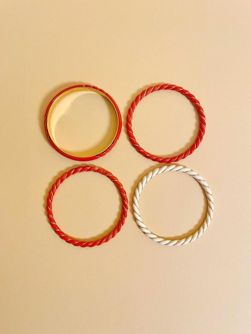 Bracciali torchon corallo e avorio