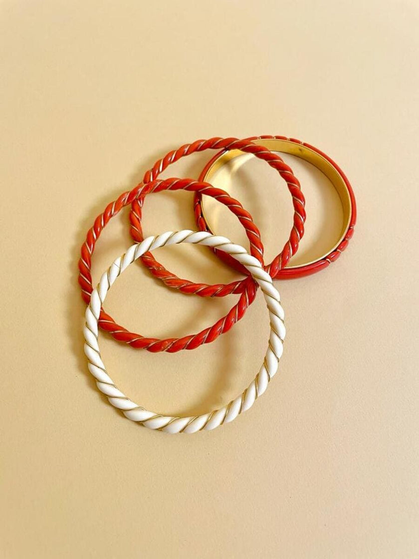 Bracciali torchon corallo e avorio
