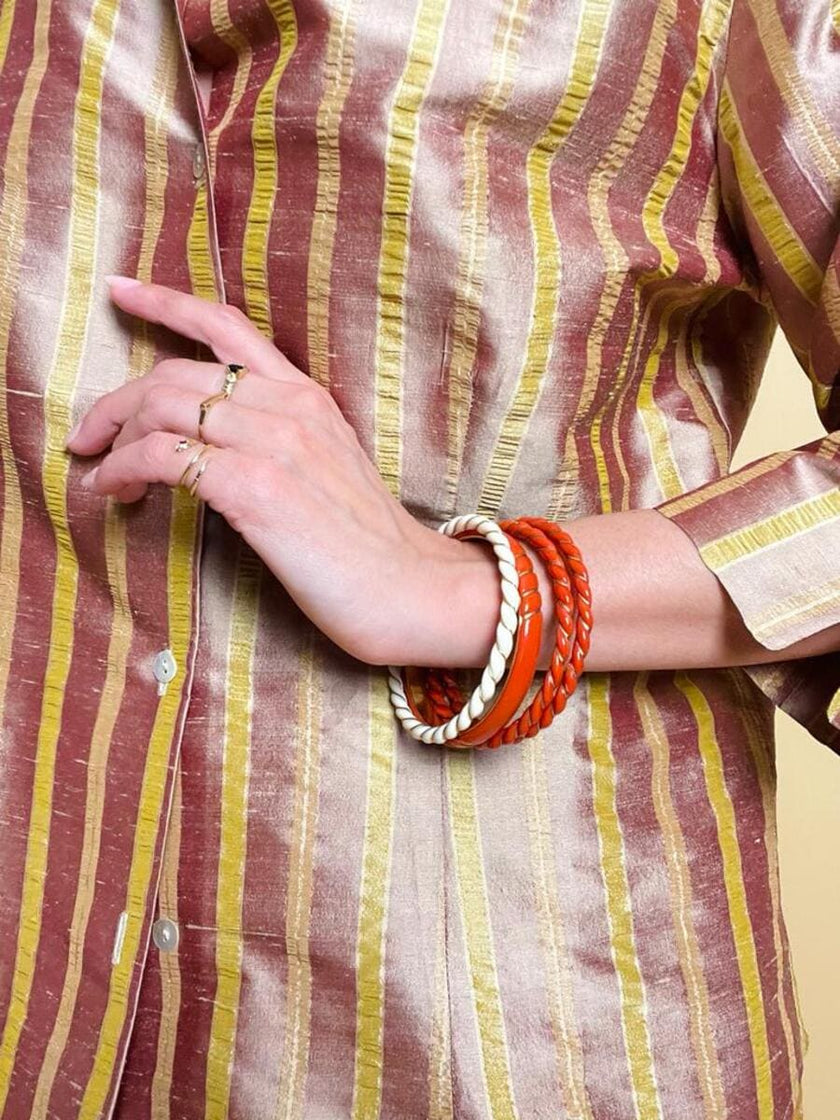 Bracciali torchon corallo e avorio