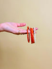 Bracciali torchon corallo e avorio