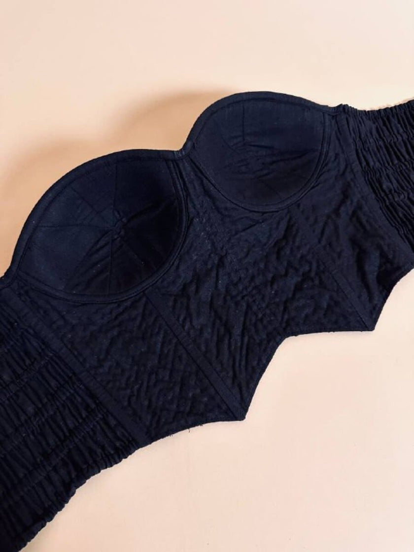 Bustier nero ricamato con perline in tinta
