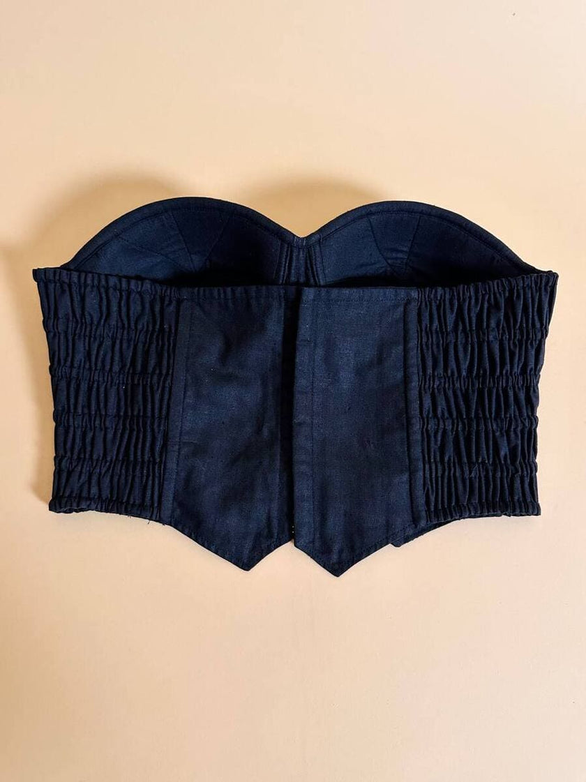 Bustier nero ricamato con perline in tinta
