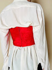 Bustier sartoriale in shantung rosso lavorato a pieghe