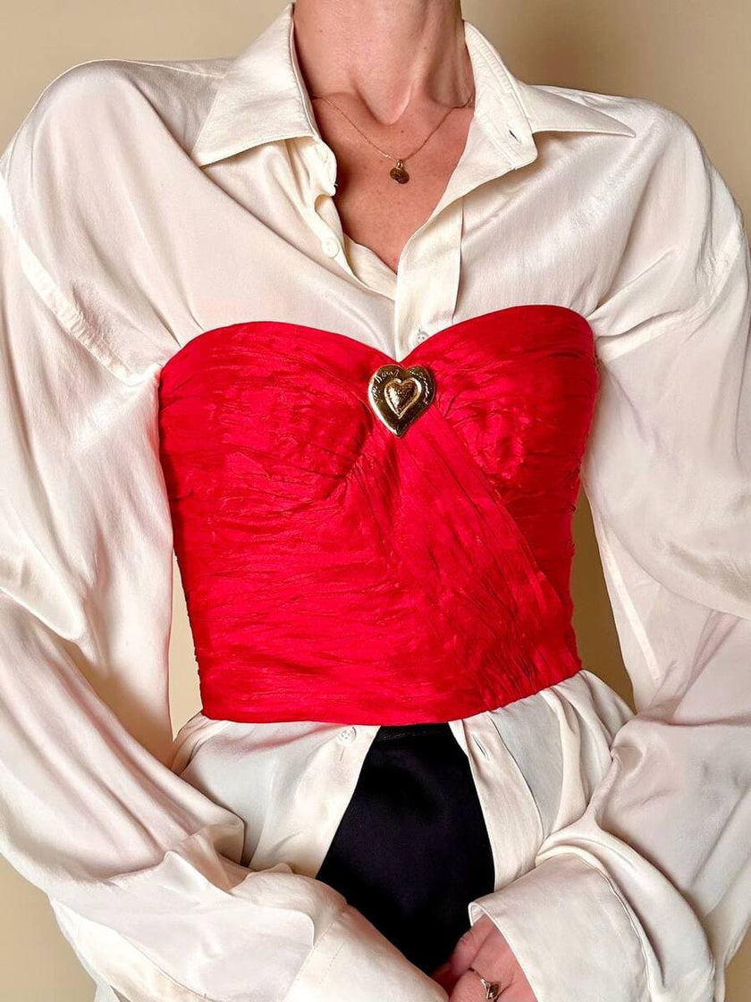 Bustier sartoriale in shantung rosso lavorato a pieghe