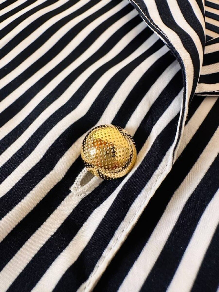 Camicia a righe bianche e blu “Nina Ricci”