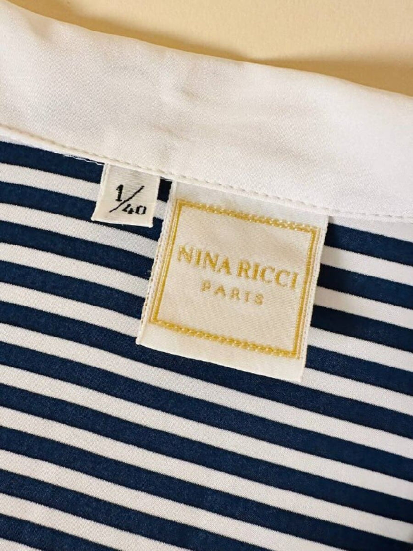 Camicia a righe bianche e blu “Nina Ricci”