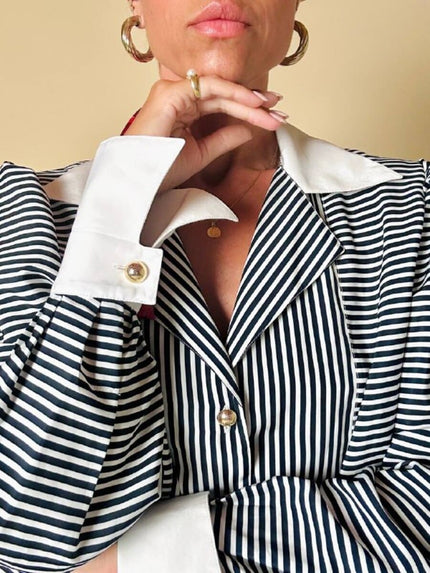 Camicia a righe bianche e blu “Nina Ricci”
