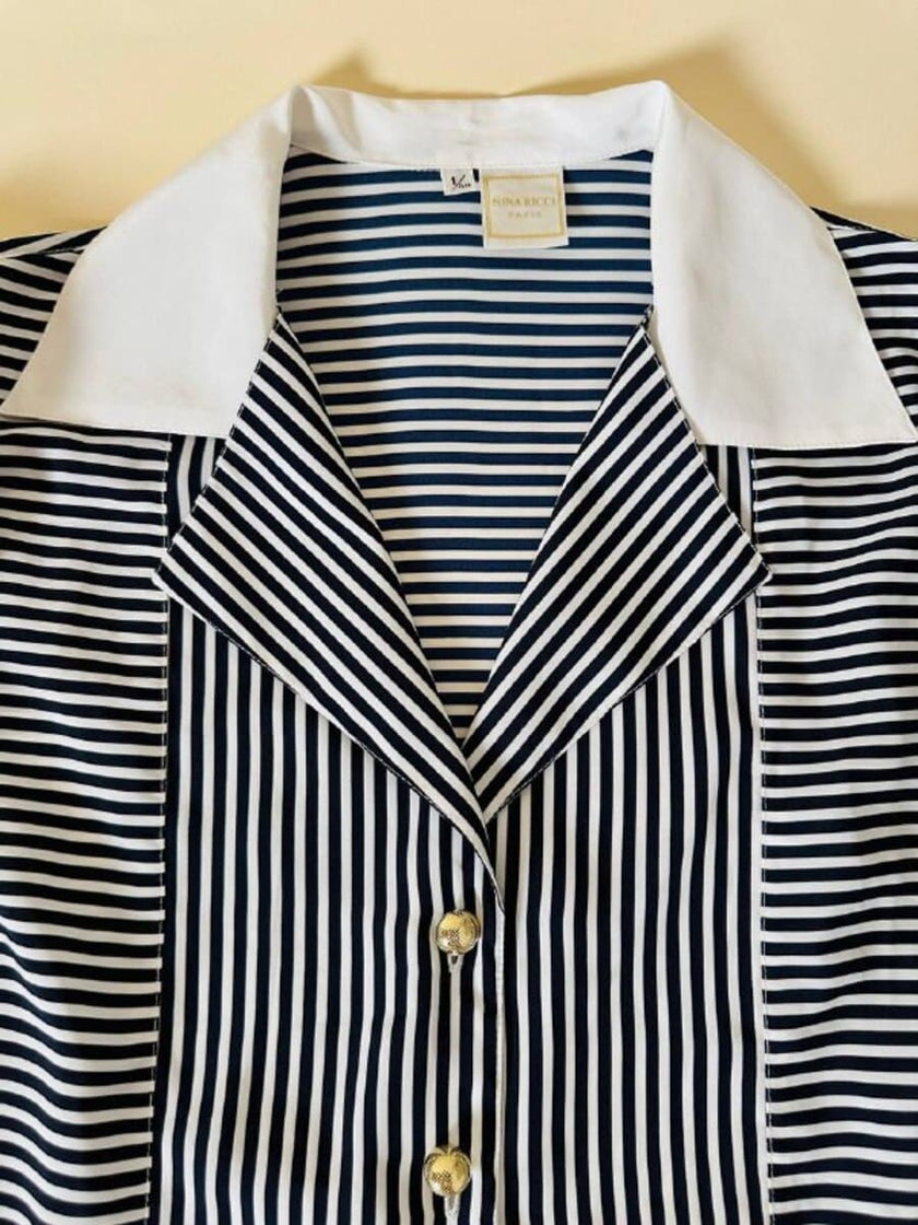 Camicia a righe bianche e blu “Nina Ricci”
