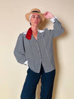 Camicia a righe bianche e blu “Nina Ricci”