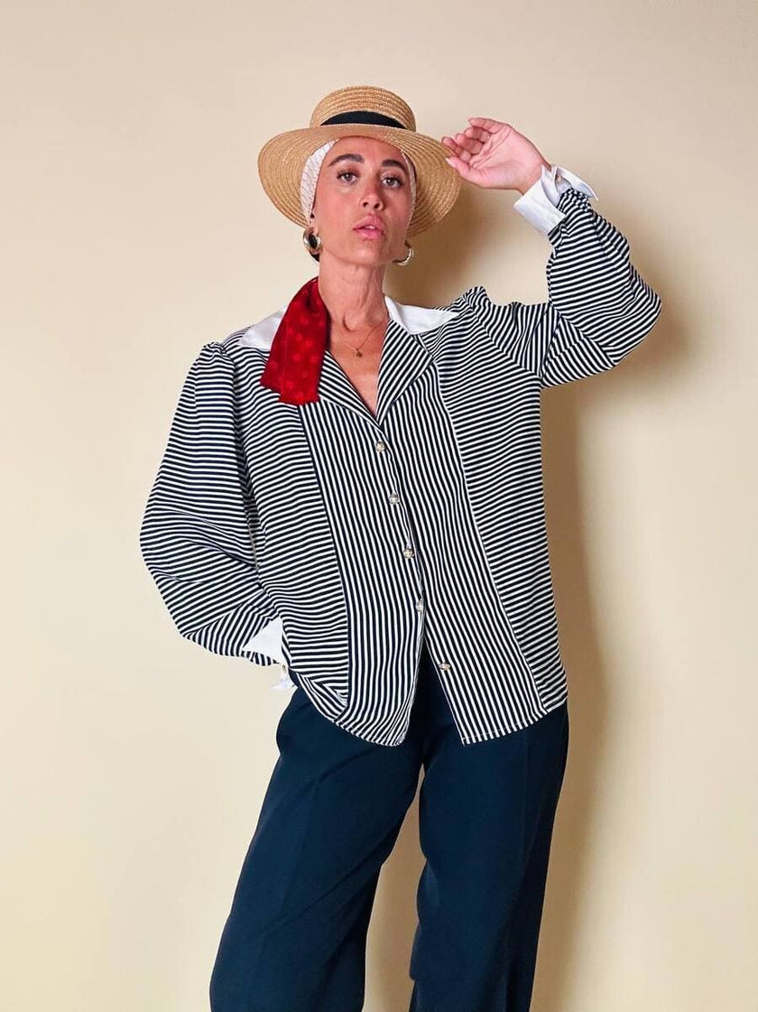 Camicia a righe bianche e blu “Nina Ricci”