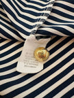 Camicia a righe bianche e blu “Nina Ricci”