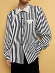 Camicia a righe bianche e blu 
