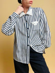 Camicia a righe bianche e blu 