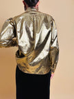 Camicia in lamè oro con bottoni gioiello 