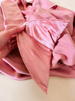 Camicia con fiocco al collo in raso di seta rosa 