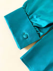 Camicia con fiocco al collo in raso di seta verde Caraibi “Ivana Zanini”