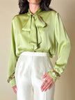 Camicia con fiocco in raso di seta verde pistacchio “Gucci”