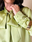 Camicia con fiocco in raso di seta verde pistacchio “Gucci”