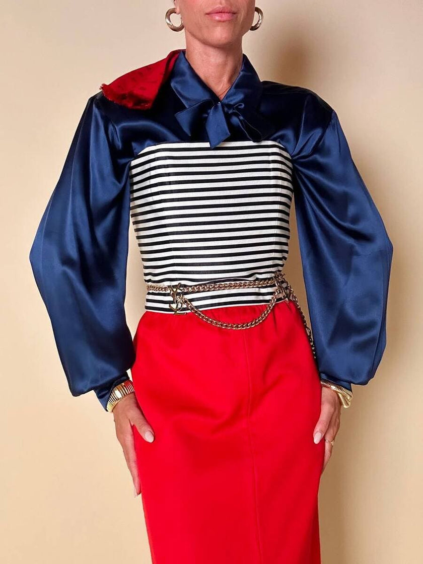 Longuette rossa con abbottonatura posteriore “Yves Saint Laurent”