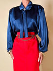Longuette rossa con abbottonatura posteriore “Yves Saint Laurent”